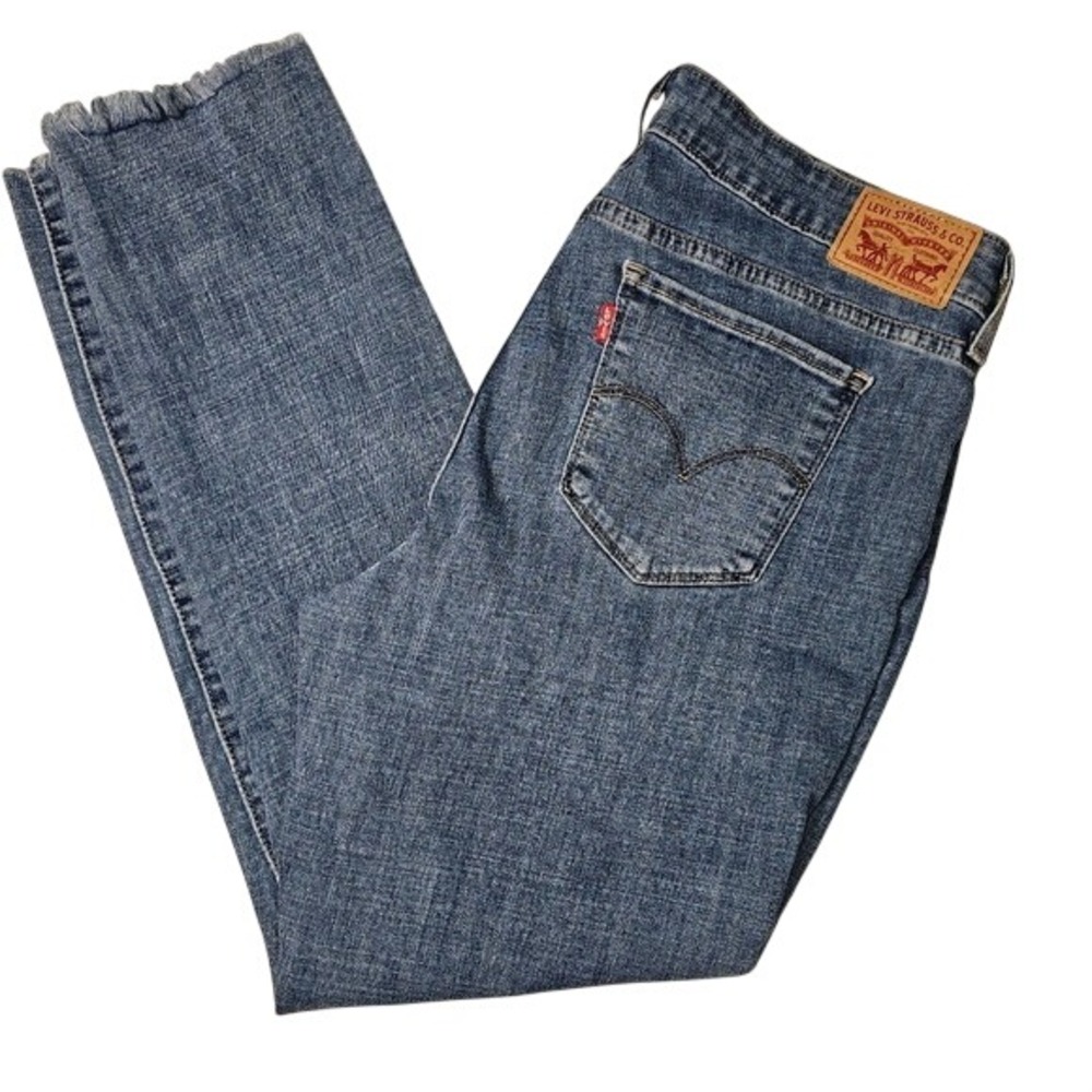 Levis Women's 711 Skinny Jean, Medium Wash, Mid Rise, Frayed Hem Size 33